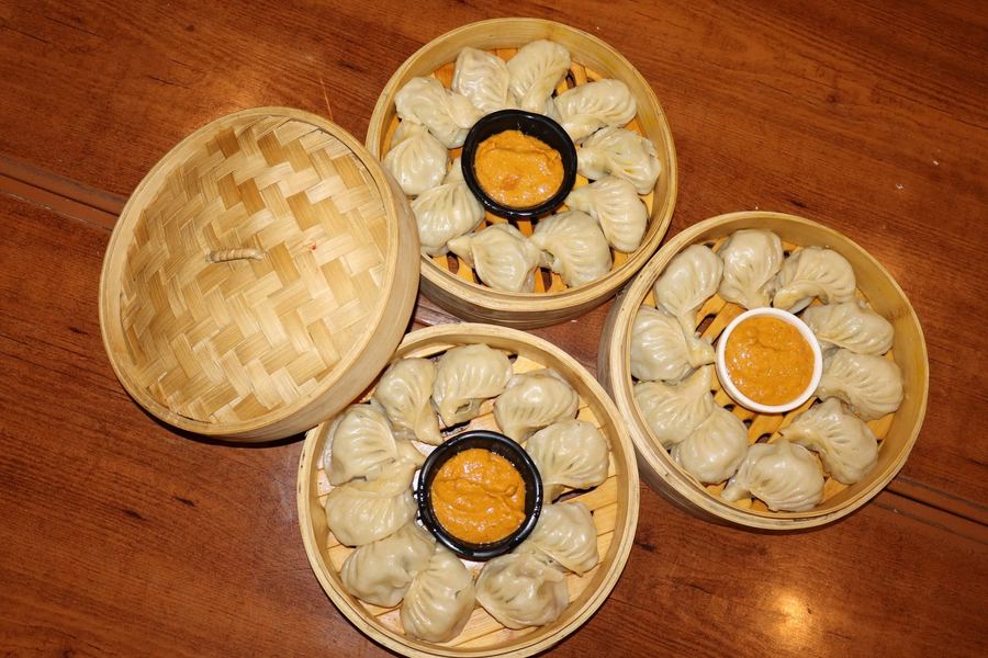 Momo steamed in bamboo baskets with achar